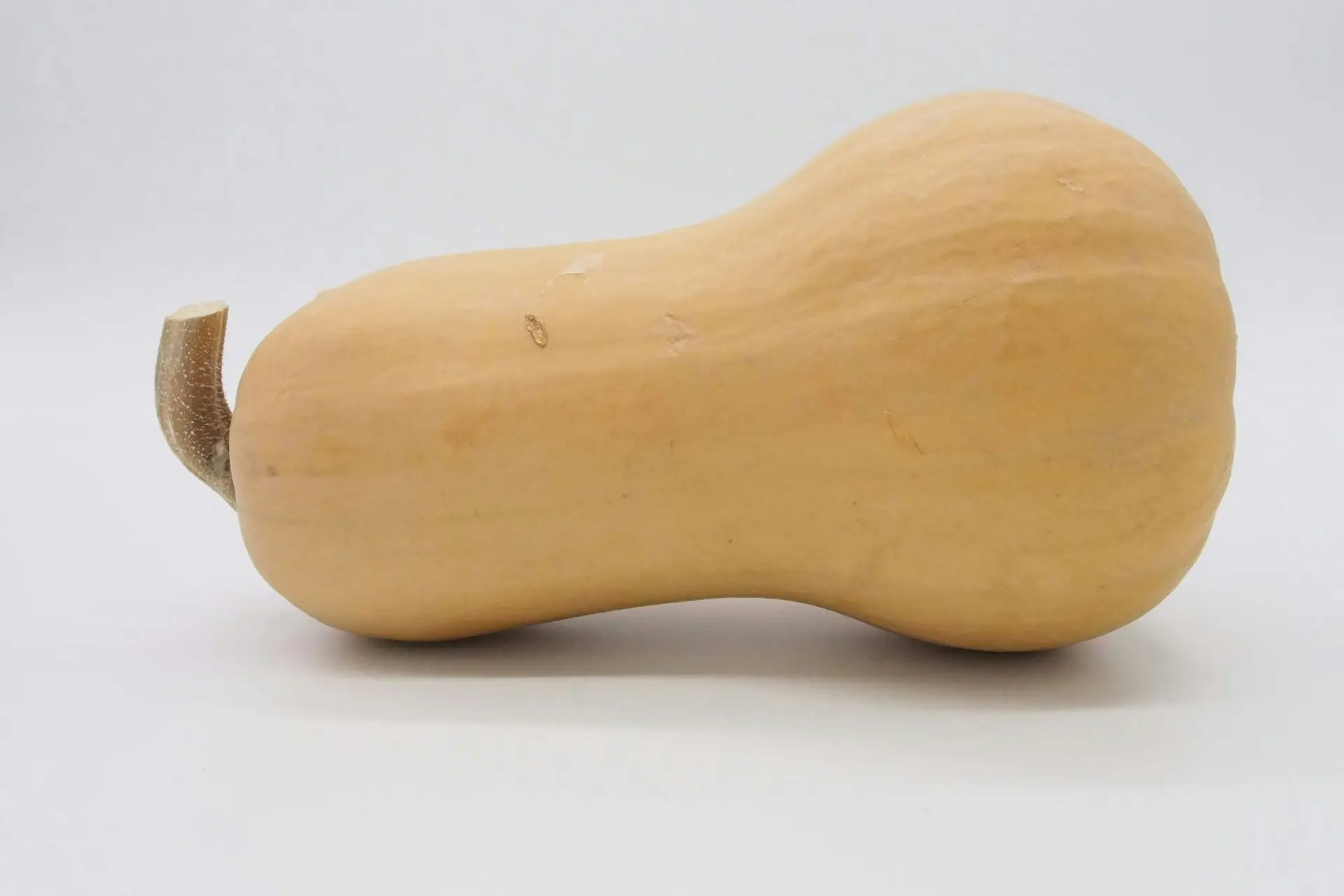 brown potato on white table